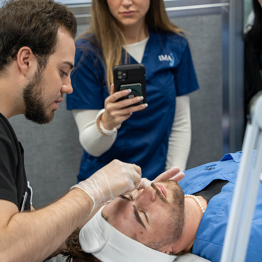 Medical esthetician performing a chemical peel treatment