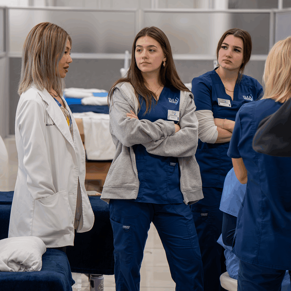 Students at IMAJ Institute listen attentively to an instructor